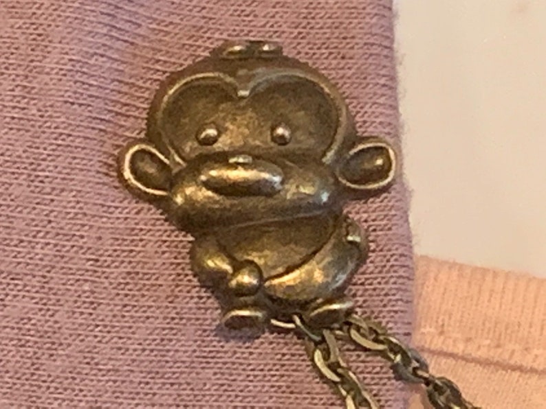 Monkeys in Bronze Collar Pins