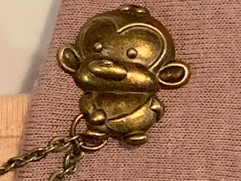 Monkeys in Bronze Collar Pins