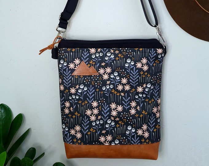 Medium crossbody/FOREST FLOOR print front = pocket/Black zipper/Black canvas reverse/Black nylon adjustable strap/Mountain or Montana patch