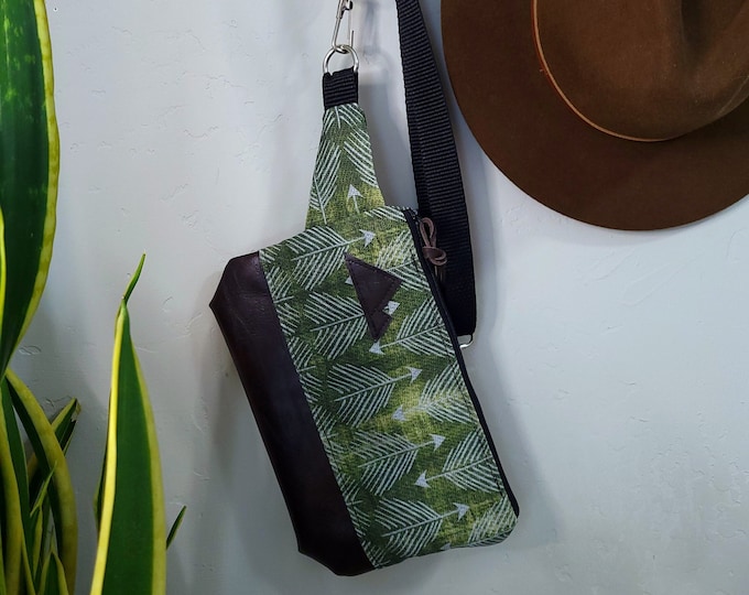 Sling bag/GREEN FEATHERED print = front and back/Black zipper/Black nylon adjustable & detachable strap/Mountain patch