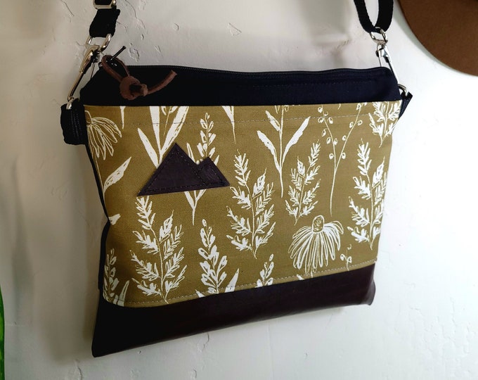 Small crossbody/OLIVE FLORAL print front = pocket/Gray & white/Black zipper/Black canvas/Black nylon adjustable strap/MT or Mountain patch