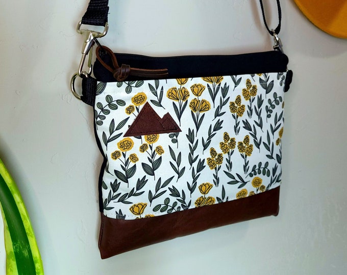 Small crossbody/MORNING SUN FLORAL print front = pocket/Black zipper/Black canvas/Black nylon adjustable strap