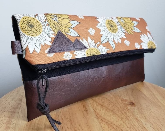 Foldover clutch/Orange sunflower print/Black canvas reverse/Black zipper/Montana or Mountain patch