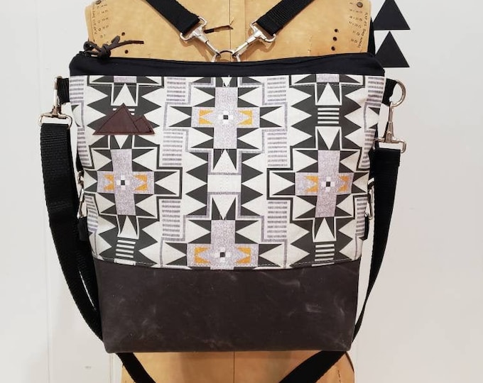 Convertible Backpack/Crossbody/Westward print=2 front pockets/Black canvas/Black zip/Black adjustable nylon straps/MT or Mountain