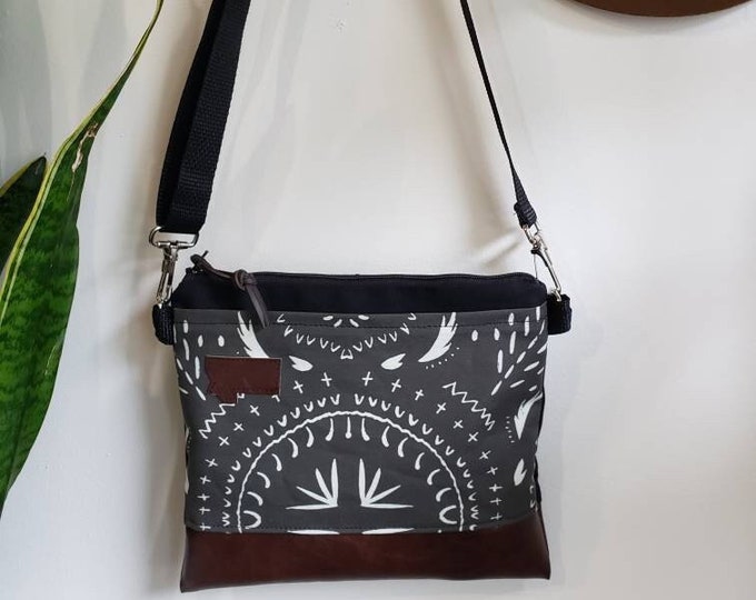 Small crossbody/Bohemian print in charcoal = front pocket/Black zipper/Black canvas reverse/Black nylon adjustable strap