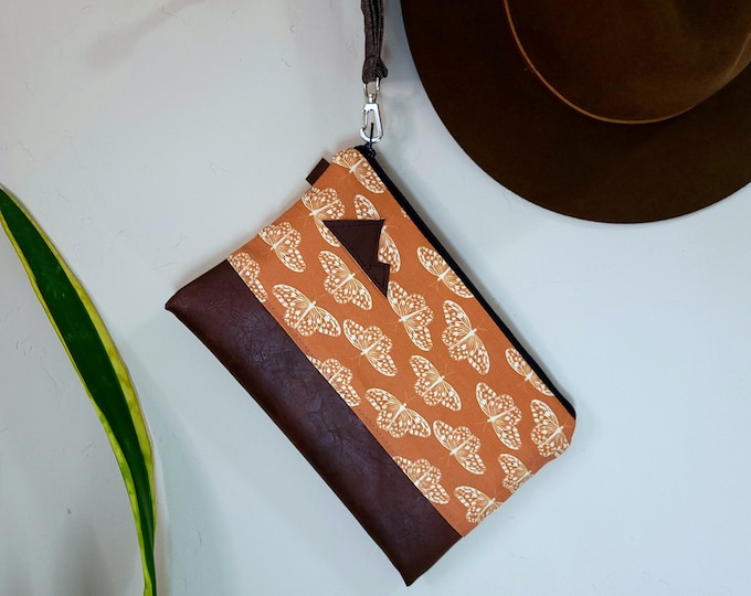 Wristlet Clutch/MONARCH print front and back/Black zipper/Montana or Mountain patch