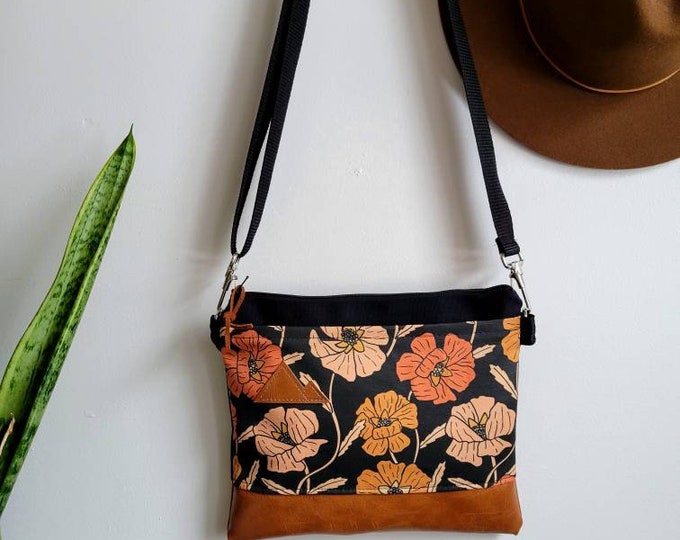 Small crossbody/POPPY print front = pocket/Black zipper/Black canvas/Black nylon adjustable strap/Mountain or MT patch