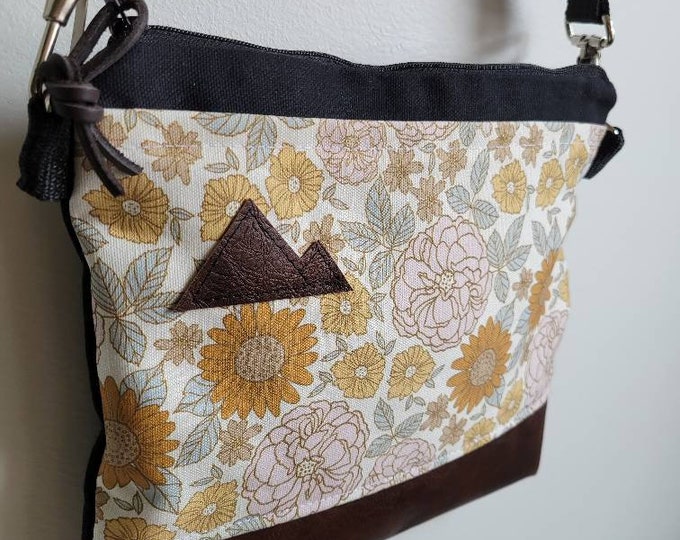 Small crossbody/VINTAGE FLORAL print front = pocket/Black zipper/Black canvas/Black nylon adjustable strap/Mountain or MT patch