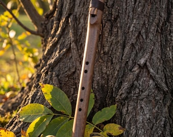 Handcrafted Native American style flute in walnut, tuned to 432 Hz in the key of G.