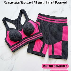 May include: A crochet athletic support set consisting of a racerback sports bra and high-waisted shorts in dark gray and bright pink. The text reads: ATHLETIC SUPPORT SET, Compression Structure | All Sizes | Instant Download, INSTANT DOWNLOAD, PDF PATTERN, COMPRESSION SUPPORT.