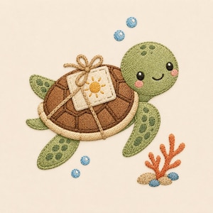 May include: An embroidered patch of a green sea turtle with a brown shell. A small square tag with a yellow sun icon is tied to the shell with a tan string. The turtle is surrounded by blue bubbles and a small orange coral branch with pebbles.
