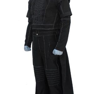 May include: A black costume set featuring a cropped top with vertical stitching and matching trousers with reinforced knee panels. The ensemble includes long sleeves, a high neckline, and a long back panel, all accented with prominent white topstitching.