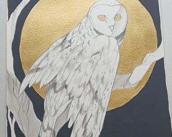 Hibou qui se découpe en or