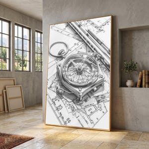May include: A black and white wall art print featuring a detailed illustration of a vintage-style magnetic compass resting on top of technical architectural blueprints and drafting tools, with visible measurement markings and geometric lines.