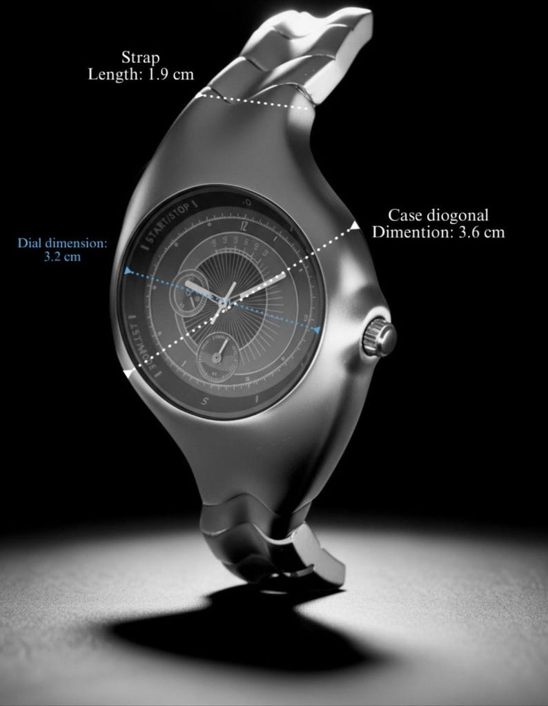 May include: A silver wristwatch with a distinctive, curved shape. The dial is 3.2 cm, and the case diagonal is 3.6 cm. The strap is 1.9 cm wide. The watch face includes the text "START/STOP 1" and "I ISTIMODE".