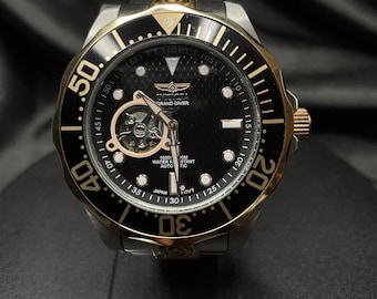 Reloj Invicta Grand Diver para hombre, automático, con mecanismo visible, de acero inoxidable y acabado en oro rosa, modelo 13708.
