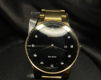 Reloj Citizen Eco-Drive Axiom para hombre, color oro con diamantes, 40 mm, movimiento solar japonés.