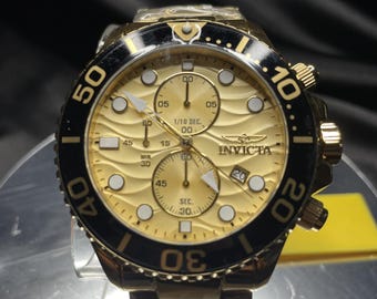 Reloj Invicta Pro Diver para hombre, modelo 50225, con cronógrafo iSize japonés, 53 mm, oro y cuarzo.