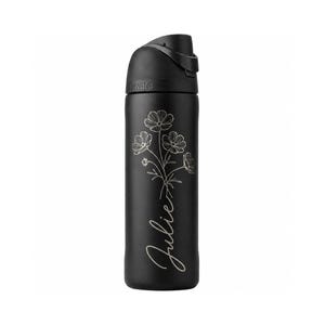 May include: A black Owala water bottle with a flip-top lid. The bottle features a floral design and the name "Julie" in cursive script. The bottle is designed to keep drinks cold and is ideal for everyday use.