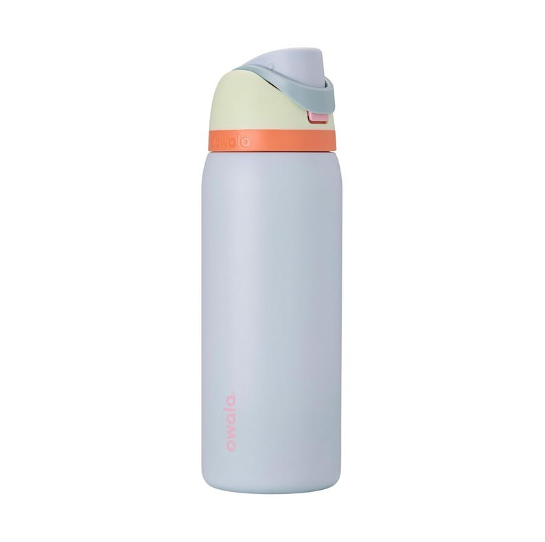 May include: A light blue insulated water bottle with a flip-top lid. The lid is a combination of pale green, orange, and light blue. The bottle has the word "owala" printed in pink on the side. This reusable bottle is designed for hydration.