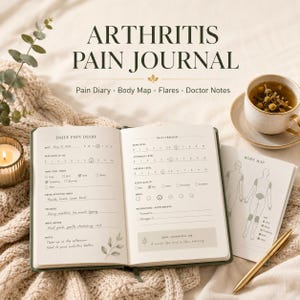 May include: An open arthritis pain journal with pages featuring a daily pain diary, tracker, and body map. The journal includes sections for pain levels, stiffness, fatigue, sleep quality, mood, and medications. A gold pen rests on the page.