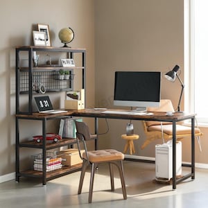May include: An L-shaped desk with a black metal frame and dark wood-grain shelves. The unit features an integrated hutch with a wire grid back panel, multiple storage shelves, and a matching chair with a tan tufted seat and dark wood backrest.