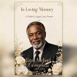 May include: A memorial portrait featuring a smiling older man with a grey beard wearing a black suit and tie. The text reads In Loving Memory, A Father's Legacy Lives Forever, Fred Michael Douglass, and 1964-2026, framed by white roses and orchids.