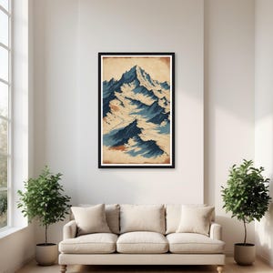 Peut inclure: Une impression d'art mural verticale encadrée représentant une illustration stylisée de chaîne de montagnes. L'œuvre utilise une palette de tons bleu profond, blanc et beige chaud, illustrant des sommets déchiquetés sur un fond papier vieilli.