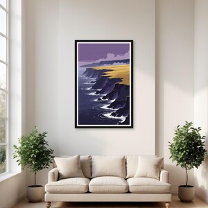 May include: A framed vertical art print featuring a stylized coastal landscape with dark purple cliffs, a bright yellow grassy plateau, and deep blue ocean waves crashing against the rocky shoreline under a muted purple sky with soft clouds.