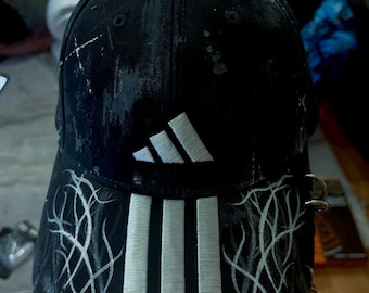 Customised and hand-painted Adidas black cap, with silver hardware and cyber-sigilism details