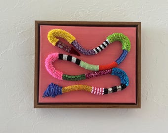 Arte de serpientes con cuentas