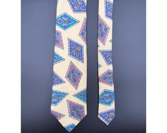 Corbata de seda con estampado geométrico de diamantes en tonos crema, azul y morado para hombre, de Colours by Alexander Julian.