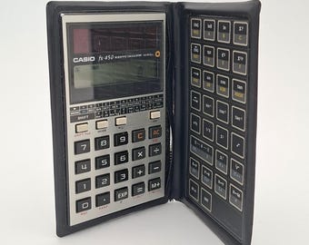 Calculadora científica solar Casio fx-450 vintage de 1983, fabricada en Japón, plegable, funciona.