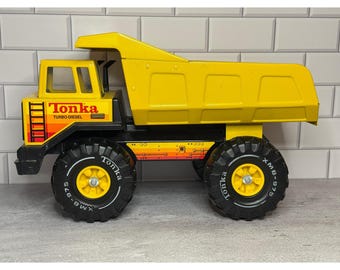 Vintage 1980s Tonka Turbo-Diesel Pressed Steel Dump Truck Yellow XMB-975 Tires