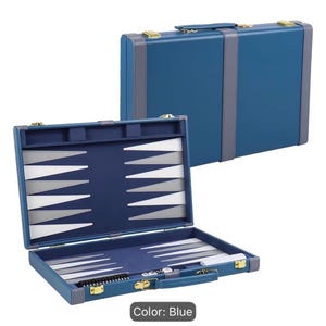 May include: A blue backgammon set in a briefcase-style case with gold-tone metal latches. The interior features a dark blue playing surface with alternating white and grey triangular points, along with a set of game pieces and dice stored inside.