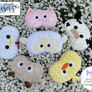 May include: A set of six plush animal sewing patterns, including a pig, cow, lamb, chicken, deer, and chick. The patterns are displayed on a bed of white flowers.  The text "Downloadable Sewing Pattern" is visible in the bottom right corner of the image.