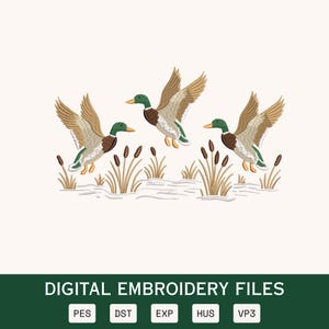 May include: Digital embroidery files featuring three ducks in flight, with detailed brown, green, and tan plumage. The ducks are depicted above cattails and water, with the text "DIGITAL EMBROIDERY FILES" and file type abbreviations below.