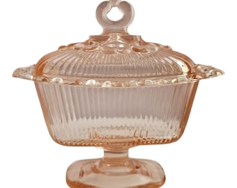 Verre à dépression rose avec couvercle