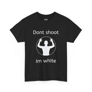 May include: Black t-shirt with white text and a graphic. The text reads "Dont shoot" above a white silhouette of a person with arms raised inside a circle. Below the graphic, the text reads "Im white".