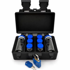 May include: A black rectangular storage case with a hinged lid and two latch closures. Inside are two large glass vials and four smaller glass vials, all featuring bright blue caps. A blue padlock and a single metal key are placed in front.