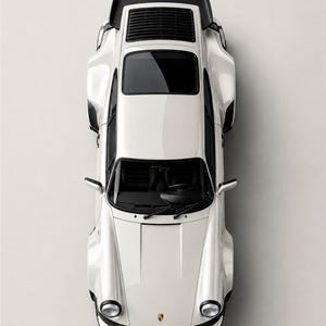 May include: Overhead view of a white Porsche Turbo sports car. The car has black accents, a rear spoiler, and the word "PORSCHE" is at the top. The word "TURBO" is at the bottom, with "CHALK" below it.