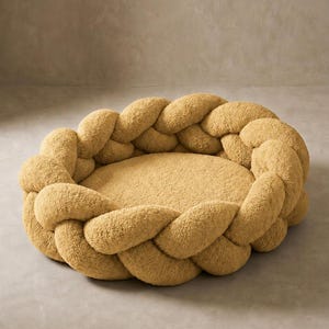 Cama para mascotas tipo donut trenzado, cojín de felpa acogedor para gatos y perros, estilo nido lavable.