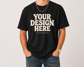 Mockup van een zwart Bella Canvas 3001 T-shirt, mockup van een mannelijk model in een studio (digitale download)