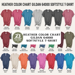 May include: A color chart for Gildan 64000 Softstyle t-shirts displaying 23 heather colors. The image features rows of short-sleeved t-shirts in various shades including red, blue, grey, green, and purple, each labeled with its specific color name.