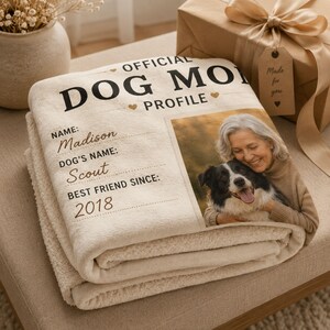 Personalized Dog Mom blanket styled in an elegant bedroom with a soft neutral interior.