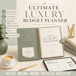 May include: An open sage green spiral-bound budget planner with gold accents, featuring the text 'ULTIMATE LUXURY BUDGET PLANNER' on the cover and interior page. The planner includes a pocket with a card reading 'YOUR FINANCIAL FREEDOM STARTS HERE'.
