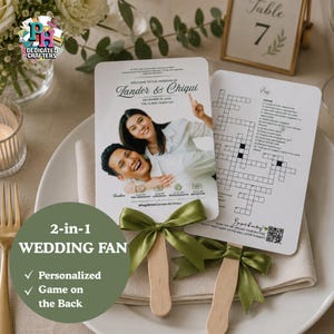 May include: A 2-in-1 wedding fan featuring a photo of a couple on the front with the text Zander & Chiqui, December 19, 2026, and a timeline. The back displays a crossword puzzle and a QR code. Each fan has a wooden handle and a green ribbon bow.