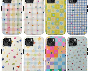 May include: Eight smartphone cases featuring various patterns including pastel plaid, checkered grids, and scattered star or sun motifs. The designs incorporate diverse color palettes such as blue, pink, yellow, green, and orange, with some cases displaying holographic or metallic star accents.