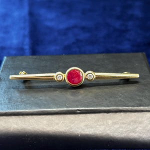 Antique brooch, 14kt gold, with natural ruby and diamonds