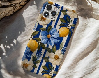 May include: A smartphone case featuring a pattern of blue and white vertical stripes decorated with yellow lemons, green leaves, and large blue and white flowers. The case has a cutout for a triple-lens camera system on the upper left corner.